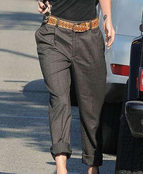 Megan looks haute in sharp tailored trousers