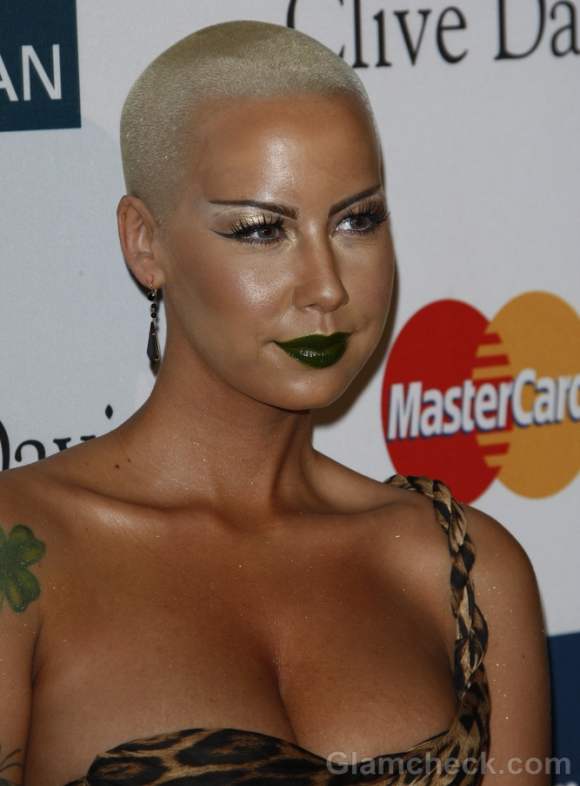 Amber Rose Dons Daring Animal Print Gown at Pre-Grammy Party